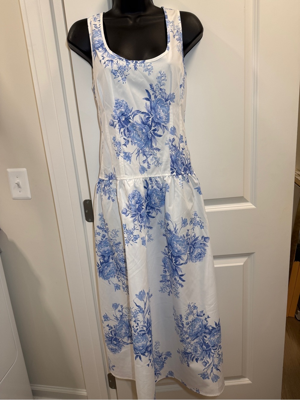 Sleeveless White Dress with Blue Floral Print